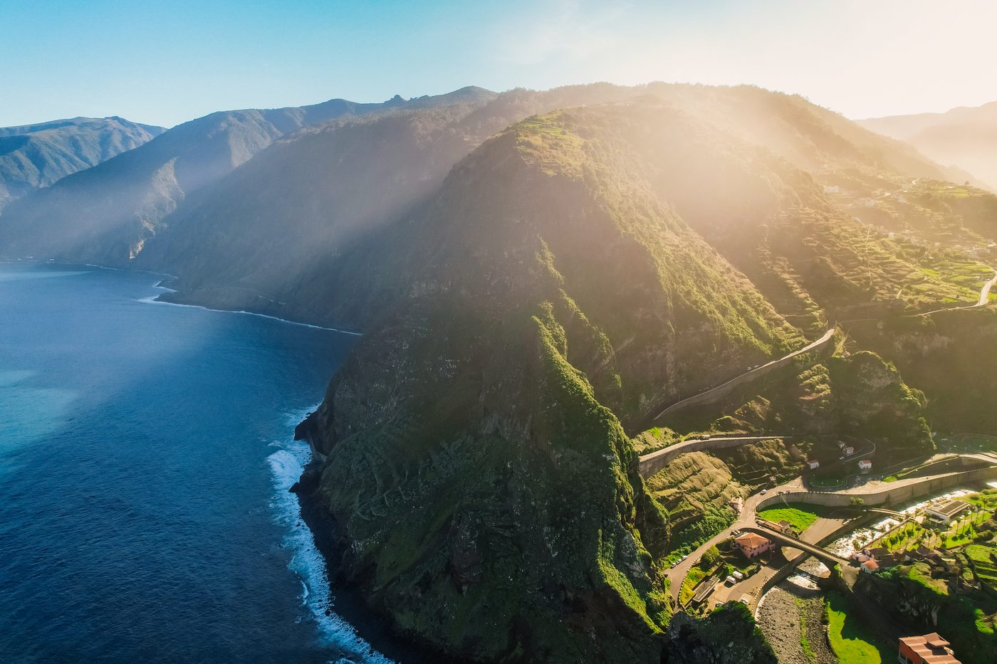 The coast road cut into the cliffs above the Atlantic